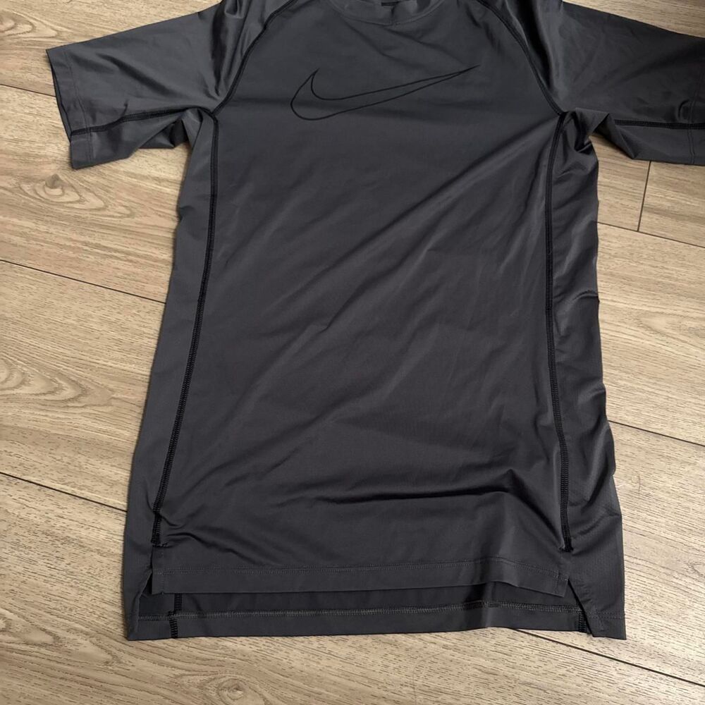 Nike Women's Grey and Black T-shirt